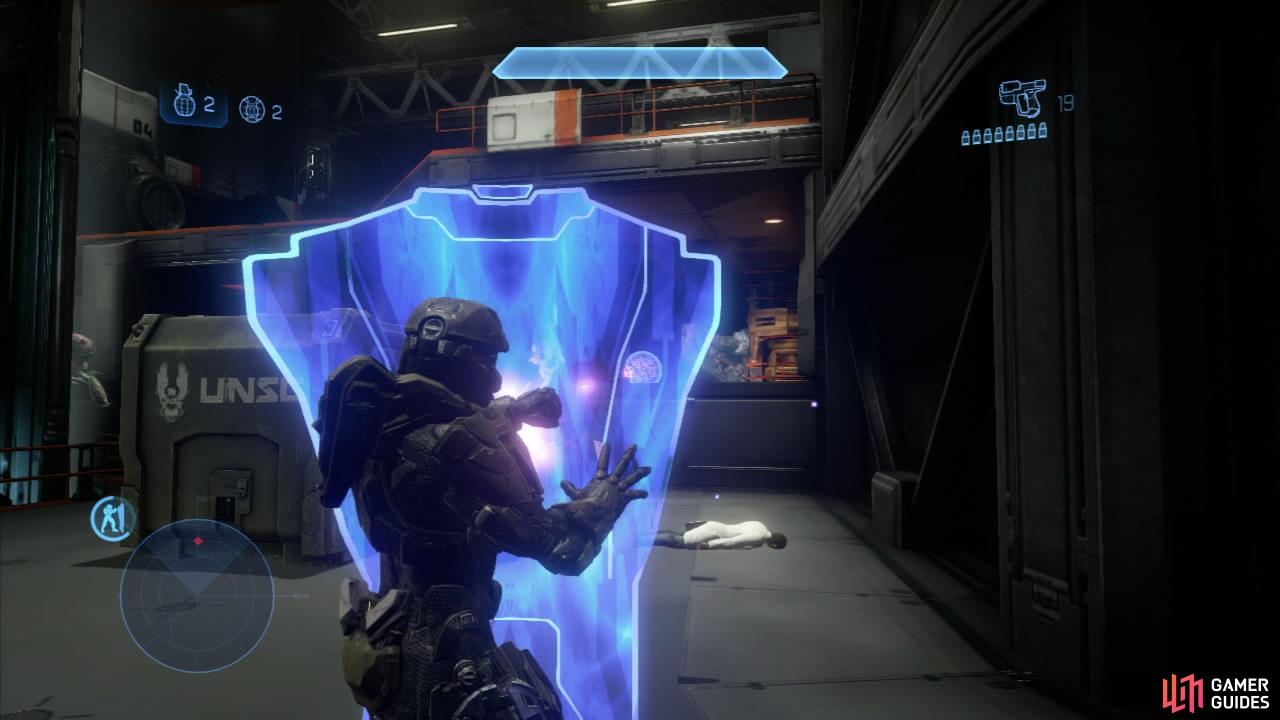 The hardlight shield appears to be Halo 4’s evolution of the ‘armor lock’ ability from Reach. This time, the shield acts more like a jackal’s shield (without the ability to wield a firearm simultaneously unfortunately). It protects from damage you might receive straight in front. Good for blocking projectiles or for waiting on someone to run out of ammo before racing in to engage them.